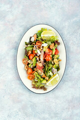 Homemade seafood salad with fish mussels, octopus.