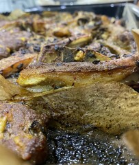 Mutton ribs on an oven grill, well done