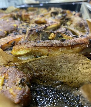 Mutton ribs on an oven grill, well done