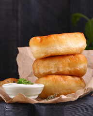 fried pies for snack on a wooden board