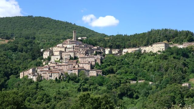 The beautiful village of Castelnuovo Val di Cecina on a sunny summer morning. Province of Pisa, Tuscany, Italy. 