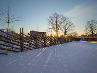 Sweden, Knislinge – January 5, 2024: residential area with low-rise buildings during sunny and snowy morning. Comfortable and typical buildings in Sweden, Scandinavia. Urbanism, landscape design.