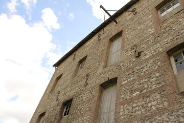 a part of the facade of the medieval building l'hermitine in the little village Vittefleur in french Normandy