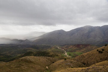 mountains in albania on a cloudy day, travel to albania, albania in november