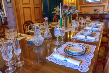 Old fashioned stylish dinner table in rustic atmosphere