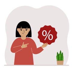 A little girl holds a percent sign in his hand. The concept of percentage, discount, promotion for training or shopping.