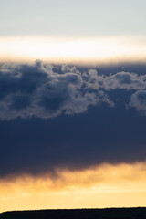 Beautiful blue and orange sky with clouds at twilight