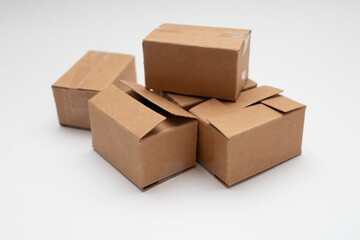 Stack of many cardboard boxes on white background