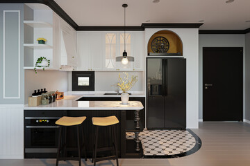 Contemporary chic open kitchen with white island and countertop, White Kitchen cabinet, fridge, also kitchen appliances.