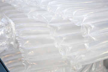 Inflatable polyethylene packaging bags with air chambers used to protect goods from damage during...