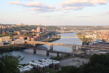 Fototapeta na wymiar Panoramic view of downtown and river. Architecture of Downtown Pittsburgh. Southwest Pennsylvania at the confluence of the Allegheny River and the Monongahela River, the Ohio River. 