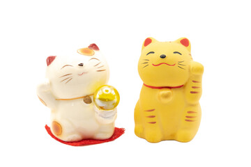 Two Maneki-neko money cats or prosperity cats isolated on white background  is a symbol of good luck, prosperity and good fortune.