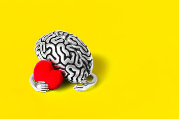 Human Brain Embracing a Red Heart on Yellow Background