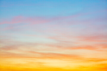 Morning clouds and sky,Real majestic sunrise sundown sky background with gentle colorful clouds without birds. Panoramic, big size