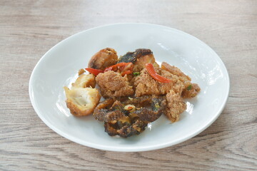deep fried slice common silver barb fish with chili sweet vinegar on plate 
