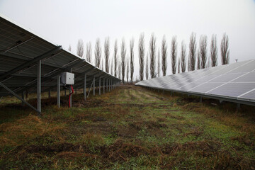 Solar panel. Solar panels installed in a rural area. Solar power plant in a field. Solar panel produces green, environmentally friendly energy from the sun.