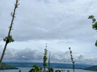 Obraz premium Cloudy Sky Against The Lake. Lake Toba taken from Sibea-bea hills, North Sumatra.