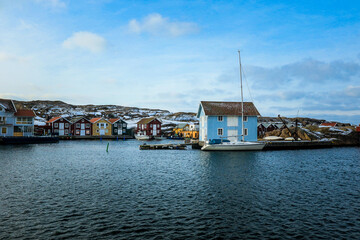 Fototapeta na wymiar Boats and Houses on Picturesque Swedish Waterfront