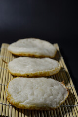 Serabi, Indonesian traditional pancakes, made of rice flour, flour and coocnut milk. Serve with palm sugar sauce.