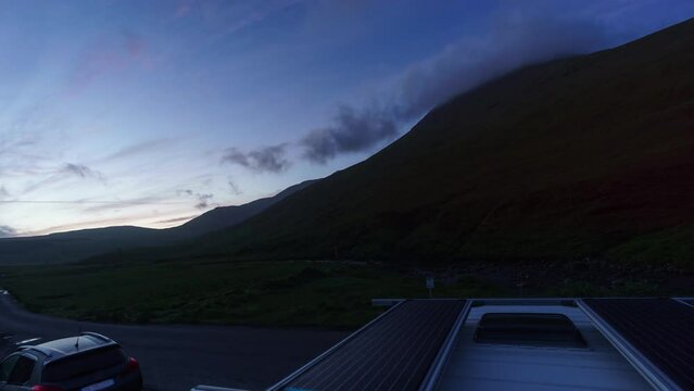 Time lapse of twilight from dusk till dawn over the mountains of Cuillins near the Fairy Pools on Isle of Skye, Scotland, United Kingdom