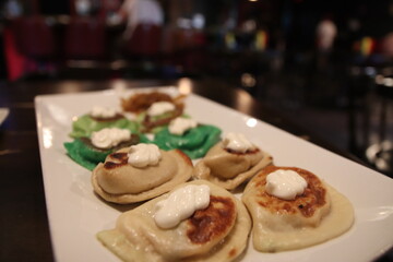 Pierogis on a plate at a restaurant in Columbus, Ohio.  