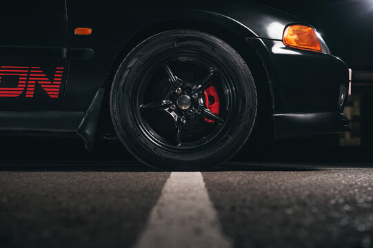 Sstreet racing car wheel. Red brakes