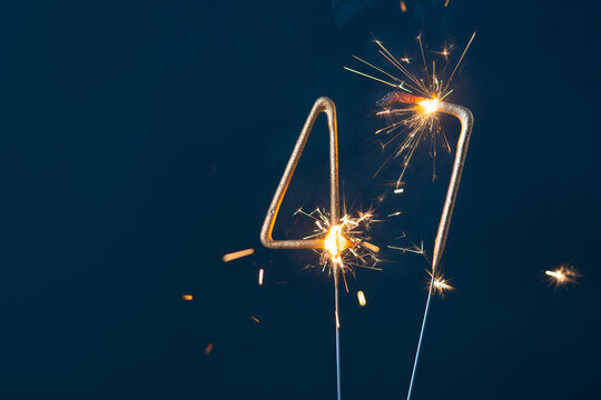 47 years celebration festive background made with Bengal fires in the form of number Forty-seven.