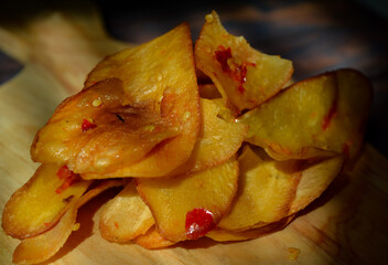 Keripik Singkong pedas or spicy Cassava Chips, Indonesian traditional snack. Made of cassava...