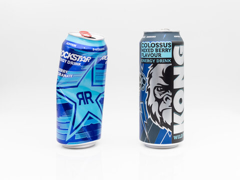 DRESDEN, GERMANY - 29. December 2023: Lidl Kong Strong versus Rockstar Energy Drink Berry flavor. The blue cans are fighting for the market share and the no name product is winning against PepsiCo.
