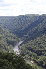 Fototapeta premium Landscape in the mountains near the New River Gorge National Park and Preserve bridge. Victor, West Virginia.