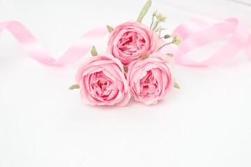 Two pink roses and ribbons isolated on white background, Valentines day