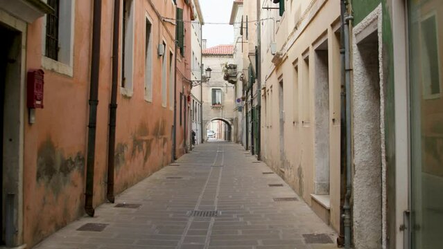 walking in Italian city narrow street