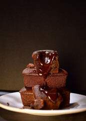 Chocolate block cake is a traditional cake made from flour, vanilla, eggs, sweetened condensed milk, baking soda, margarine and sugar.