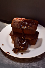 Chocolate block cake is a traditional cake made from flour, vanilla, eggs, sweetened condensed milk, baking soda, margarine and sugar.