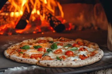 Foto op Plexiglas Appetizing close-up of fresh pizza with a traditional wood-fired oven in the background out of focus © AleksFil