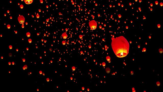 Sky lanterns, flying lanterns, floating lanterns on the black background.