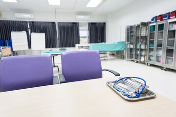 Interior of empty physician office with desk and chairs.Modern and bright doctor office with copy...
