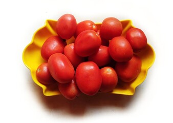 Tomato is an edible, often red, berry of the plant Solanum lycopersicum, commonly known as a tomato plant. The tomato is consumed in diverse ways, raw or cooked, sauces, salads and drinks.