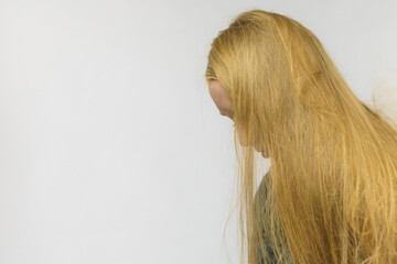 Girl hiding face with hair