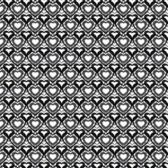 Seamless pattern of 3d black heart shapes on white background