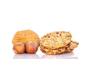 Several sweet Thaler cookies with nuts, macro, isolated on white background.	
