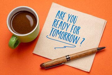 Are you ready for tomorrow question - handwriting on a napkin with a cup of coffee. Business and personal development concept.