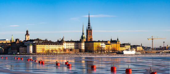 Stockholm, Sweden. Large panorama of the old city and of the island of Riddarholmen in winter,...