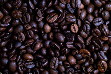 Close up roasted coffee beans, top view. Full frame