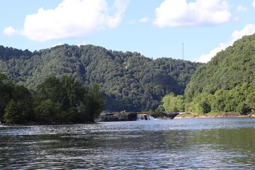 Waterfall and dam in a small river town in West Virginia. 