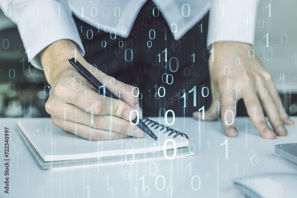Leinwandbilder creative abstract binary code hologram and hand writing in diary on background with laptop, ai and m