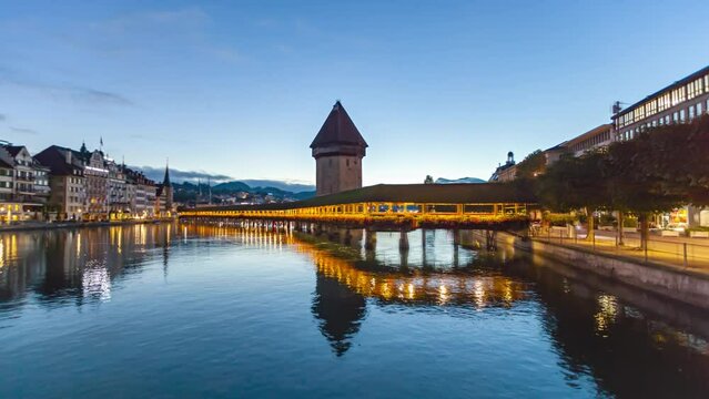 Night to day hyper lapse panorama Lucerne old town and Chapel bridge (Kapellbrucke), Switzerland.