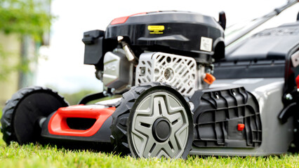 lawn mower on a freshly mowed flat lawn