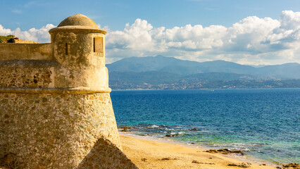 Fototapeta premium La Citadelle in Ajaccio, Old stone fortress and sandy beach in Corsica, France