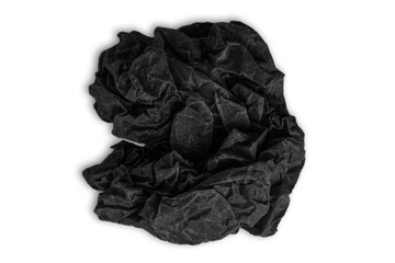 Torn crumpled black paper. ball of paper. paper ball on a clean background